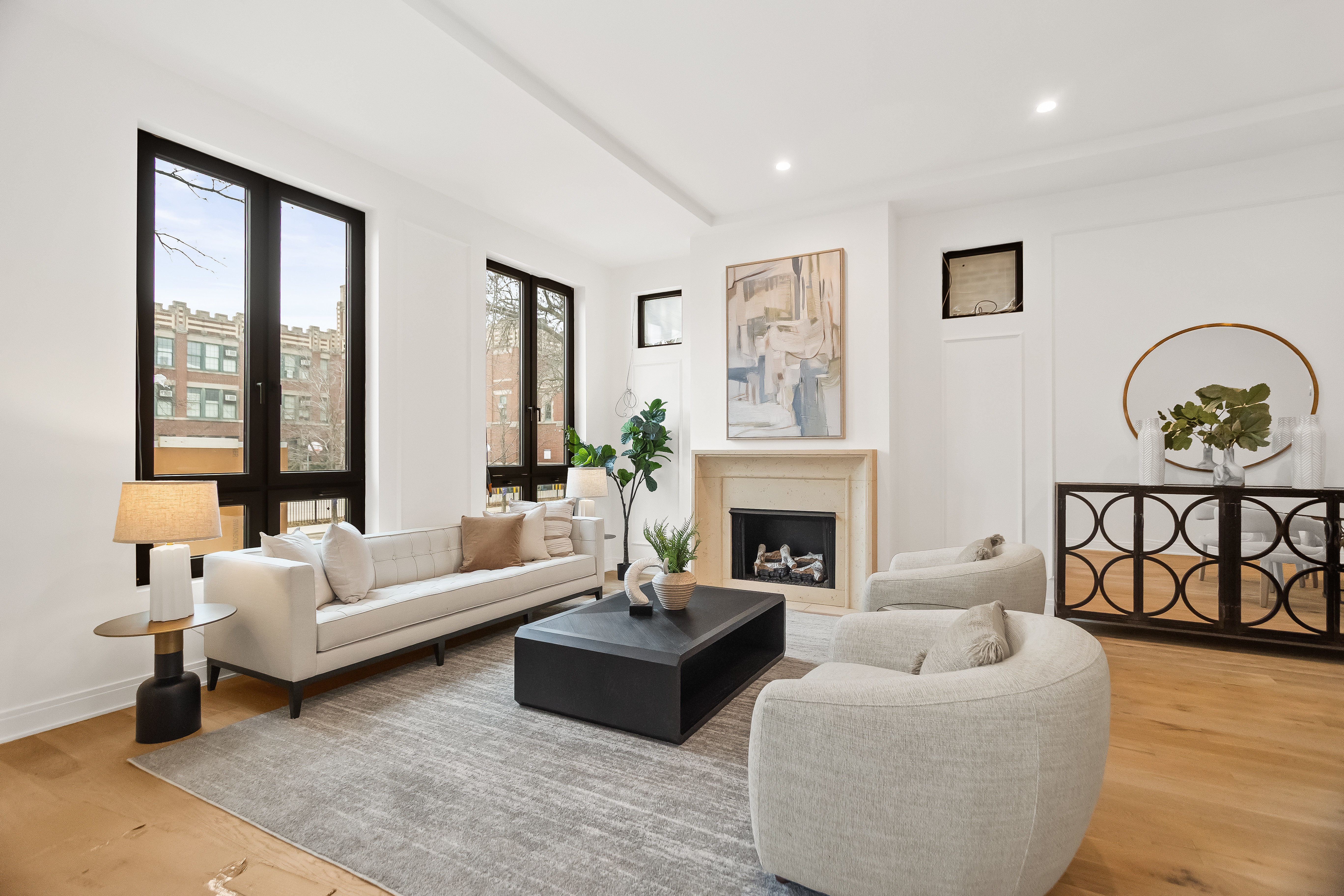 Living room facing black-framed windows