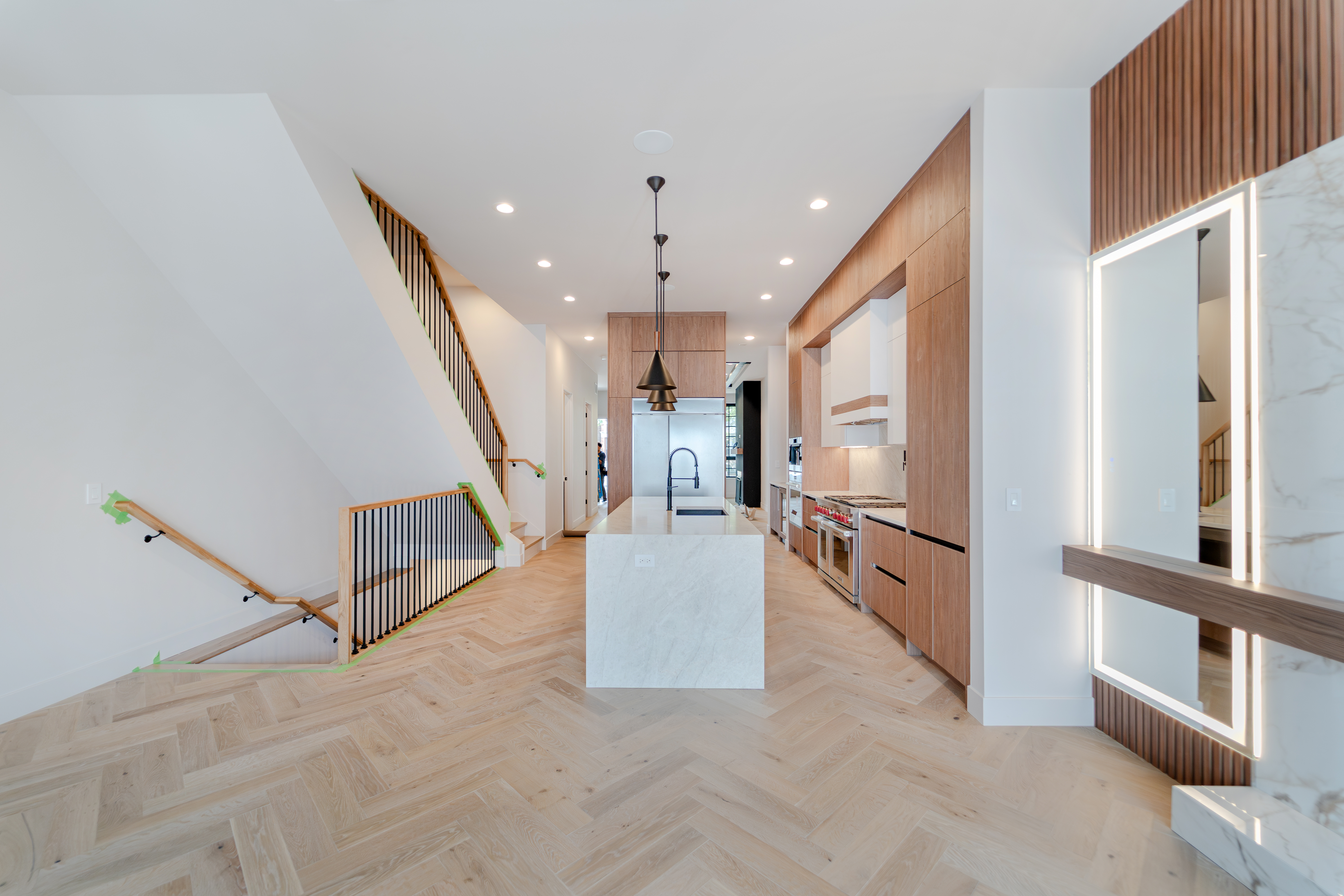 Kitchen and stairway viewed from the dining area