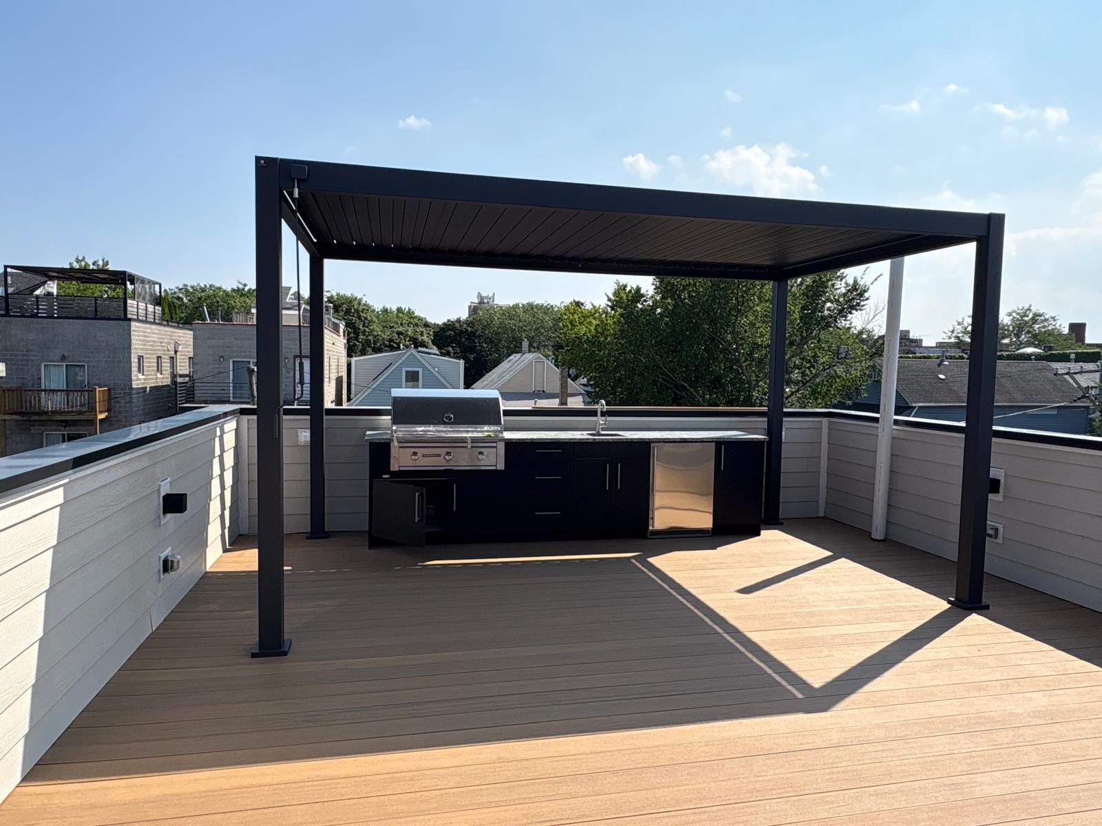 Rooftop deck with pergola and outdoor kitchen