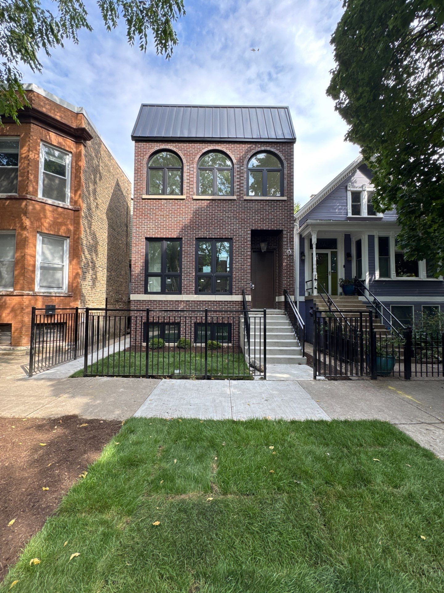 Completed front exterior of 1242 W Nelson Street